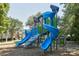 Community playground with slides and climbing structures designed for children of all ages to have fun and be active at 599 Sixth Baxter Xing, Fort Mill, SC 29708