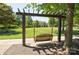 Beautifully shaded swing in the park for neighborhood relaxation at 599 Sixth Baxter Xing, Fort Mill, SC 29708