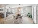 Open-concept dining area with a view of the adjacent living spaces at 7200 Morning Dew Ct, Denver, NC 28037