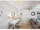 Cozy entryway featuring a desk, mirror, and neutral decor, creating an inviting and functional space at 7200 Morning Dew Ct, Denver, NC 28037