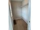 Walk-in closet with carpet and shelving at 8833 Goldfields Dr, Charlotte, NC 28227