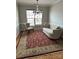 Traditional dining room features hardwood floors, neutral walls and a chandelier at 8833 Goldfields Dr, Charlotte, NC 28227