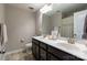 Bathroom featuring double sink vanity, a large mirror, and a shower with a neutral shower curtain at 1019 Archibald Ave, Fort Mill, SC 29708