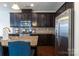 Well-appointed kitchen with granite counters, stainless steel appliances, and dark cabinetry at 1019 Archibald Ave, Fort Mill, SC 29708