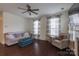 Cozy living room space featuring a ceiling fan, and hardwood floors throughout at 1019 Archibald Ave, Fort Mill, SC 29708