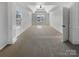 Spacious bedroom with neutral walls, carpet floors, large windows and decorative columns at 111 Chaffee Pl, Mooresville, NC 28115