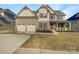 Charming two-story home featuring a two-car garage and craftsman-style details at 111 Chaffee Pl, Mooresville, NC 28115