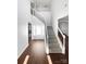 Spacious foyer with hardwood floors, stairway, and an abundance of natural light at 111 Chaffee Pl, Mooresville, NC 28115
