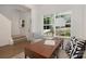 Inviting office with bright windows, modern desk, and comfortable seating, perfect for productivity and relaxation at 1156 Nations Dr, Charlotte, NC 28217