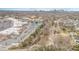 Panoramic aerial view of the city showing the skyline, residential areas, shopping centers, and green spaces at 1300 Reece Rd # 200, Charlotte, NC 28209