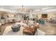 Spacious open-concept layout, featuring a living area, dining area, and a glimpse of the modern kitchen at 1300 Reece Rd # 200, Charlotte, NC 28209