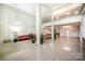 A grand lobby area with comfortable seating and a bright atmosphere at 1300 Reece Rd # 200, Charlotte, NC 28209