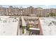 Elevated view overlooking building rooftops and parking areas, revealing landscaping and architectural elements at 1300 Reece Rd # 200, Charlotte, NC 28209