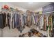 A walk-in closet provides ample space for storage and organization at 1300 Reece Rd # 200, Charlotte, NC 28209