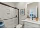 Modern bathroom with a glass-enclosed shower, white subway tile, and sleek fixtures at 138 Nicholson Ln, Mooresville, NC 28115