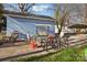 Backyard patio area, with a swing, furniture, and potential for outdoor relaxation and entertaining at 148 Linwood Dr, Albemarle, NC 28001