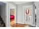 Hallway showcasing the bedroom and bathroom entrances and hardwood floors at 148 Linwood Dr, Albemarle, NC 28001