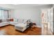 Comfortable living room with a sectional sofa, hardwood floors, and view to bathroom at 148 Linwood Dr, Albemarle, NC 28001