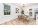 Cozy dining area with natural light, wood floors and modern decor at 1498 Oakridge Farm Hwy, Mooresville, NC 28115