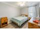 Bedroom with natural light and wooden furniture at 1515 Kingdom Way, Indian Land, SC 29707