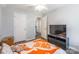 Neutral bedroom featuring a Tennessee Volunteers blanket and ample closet space at 1515 Kingdom Way, Indian Land, SC 29707