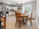 Eat-in kitchen featuring a stainless steel refrigerator and access to backyard at 1515 Kingdom Way, Indian Land, SC 29707