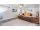 Comfortable living room with couch, neutral colors and view into the hallway at 1515 Kingdom Way, Indian Land, SC 29707
