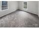 Neutral bedroom with plush carpet and natural light creating a serene and inviting atmosphere at 1730 Saddlewood Dr, Fort Mill, SC 29715