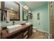 Stylish bathroom features double sinks, wood countertops, and rustic accents at 175 Riley'S Dr, Salisbury, NC 28146