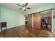 Open closet concept design with barn doors in a bedroom at 175 Riley'S Dr, Salisbury, NC 28146