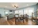 Open-concept dining area with hardwood floors and lots of natural light at 175 Riley'S Dr, Salisbury, NC 28146