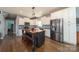 Modern kitchen with an island, stainless steel appliances, and white cabinets at 175 Riley'S Dr, Salisbury, NC 28146