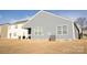 Exterior view showcasing the backyard and patio at 1949 Vanderlyn St, Monroe, NC 28112
