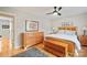 Spacious bedroom featuring wood floors, and storage dresser at 201 Oak Creek Dr, Charlotte, NC 28270