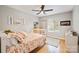 Cozy bedroom with hardwood floors, a ceiling fan, and window at 201 Oak Creek Dr, Charlotte, NC 28270