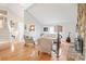 Bright living room with hardwood floors, fireplace, and open layout at 201 Oak Creek Dr, Charlotte, NC 28270