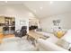 Bright and airy living room with open layout, vaulted ceiling, seamless flow to kitchen and dining areas at 201 Oak Creek Dr, Charlotte, NC 28270