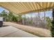 Backyard patio area with retractable awning, overlooking the lawn and providing outdoor living space at 2036 Hudson Ln, Fort Mill, SC 29707