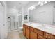 Bright bathroom featuring a double sink vanity, and glass-enclosed shower at 2036 Hudson Ln, Fort Mill, SC 29707