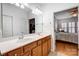 Bathroom with double sink vanity and access to the bedroom at 2036 Hudson Ln, Fort Mill, SC 29707