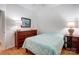 Bedroom featuring hardwood floors, dresser and bedside tables at 2036 Hudson Ln, Fort Mill, SC 29707