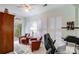 Sunlit office with built-in shelves, comfortable leather seating, and natural light at 2036 Hudson Ln, Fort Mill, SC 29707