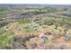 An aerial view of a home with expansive lawn space in a peaceful neighborhood at 2504 Hovis Rd, Lincolnton, NC 28092