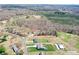 Aerial view of the property nestled amongst verdant trees, highlighting its serene location and ample land at 2504 Hovis Rd, Lincolnton, NC 28092