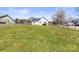 Spacious, fenced backyard with a small deck, offering plenty of room for outdoor activities and relaxation at 2504 Hovis Rd, Lincolnton, NC 28092