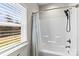 Bright bathroom with a white shower and light coming through window at 2504 Hovis Rd, Lincolnton, NC 28092