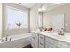 Bathroom featuring double vanity, marble countertop and a large window at 2504 Hovis Rd, Lincolnton, NC 28092