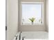 A white bathtub with neutral walls and light shining in from window at 2504 Hovis Rd, Lincolnton, NC 28092