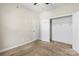 Neutral bedroom with carpet, ceiling fan and white closet and doors at 2504 Hovis Rd, Lincolnton, NC 28092