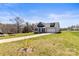 Two-story home with a garage and long driveway leading up to the house at 2504 Hovis Rd, Lincolnton, NC 28092